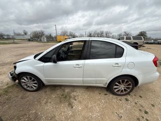 2011 Suzuki SX4 - Exterior Side Driver Image
